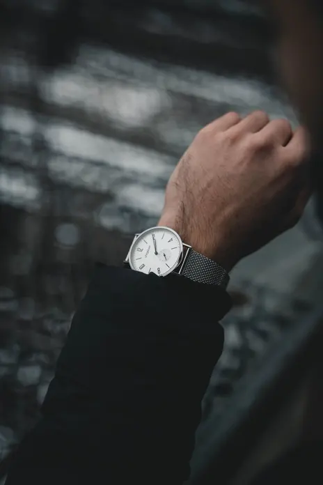 A watch worn on a bare forearm, showing its size against the wearer — stand-in photograph